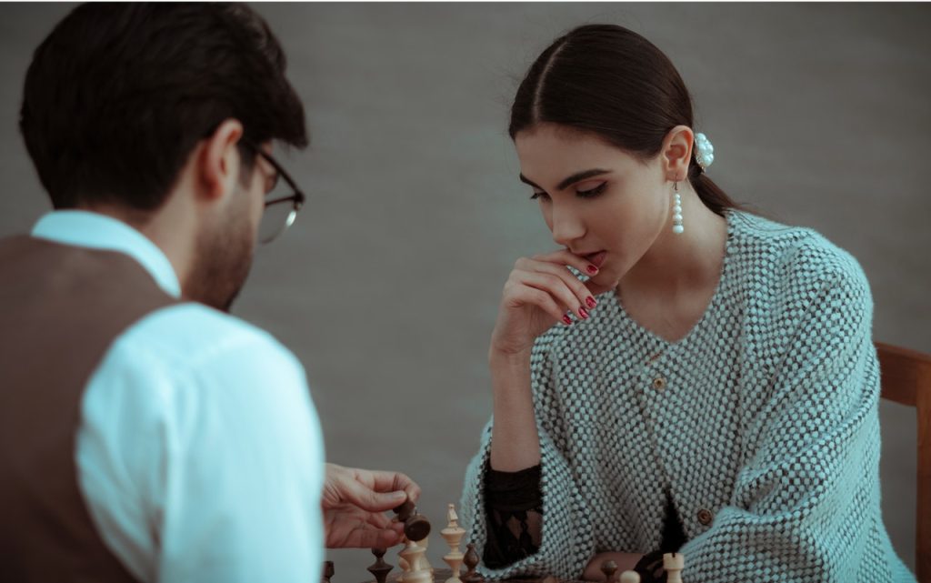 couple playing chess